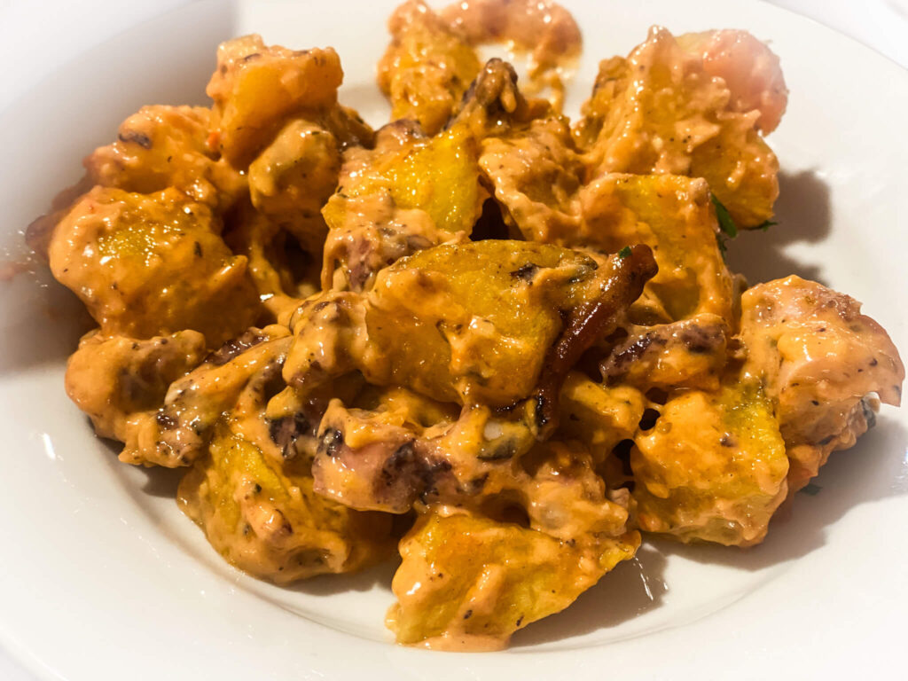 Patatas bravas with octopus in Castellon