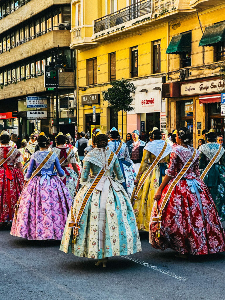 Traditional Las Falleras dresses showcased during the festival of Fallas
